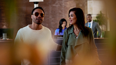 Couple in hotel lobby