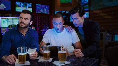 three men playing at the Sportsbook